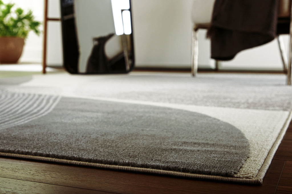 Winderburg rug corner with wavy stripes in dark gray and light gray