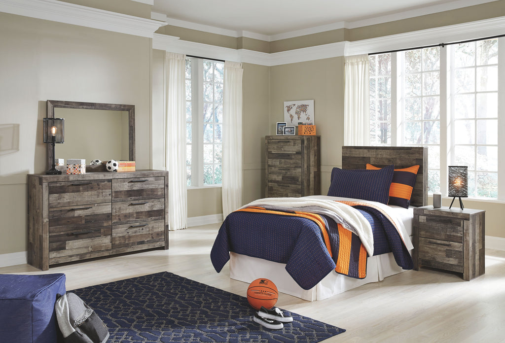 Dark gray bed with headboard and frame, white bedding with striped throw