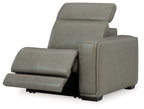 Gray power recliner chair with footrest extended and angled backrest