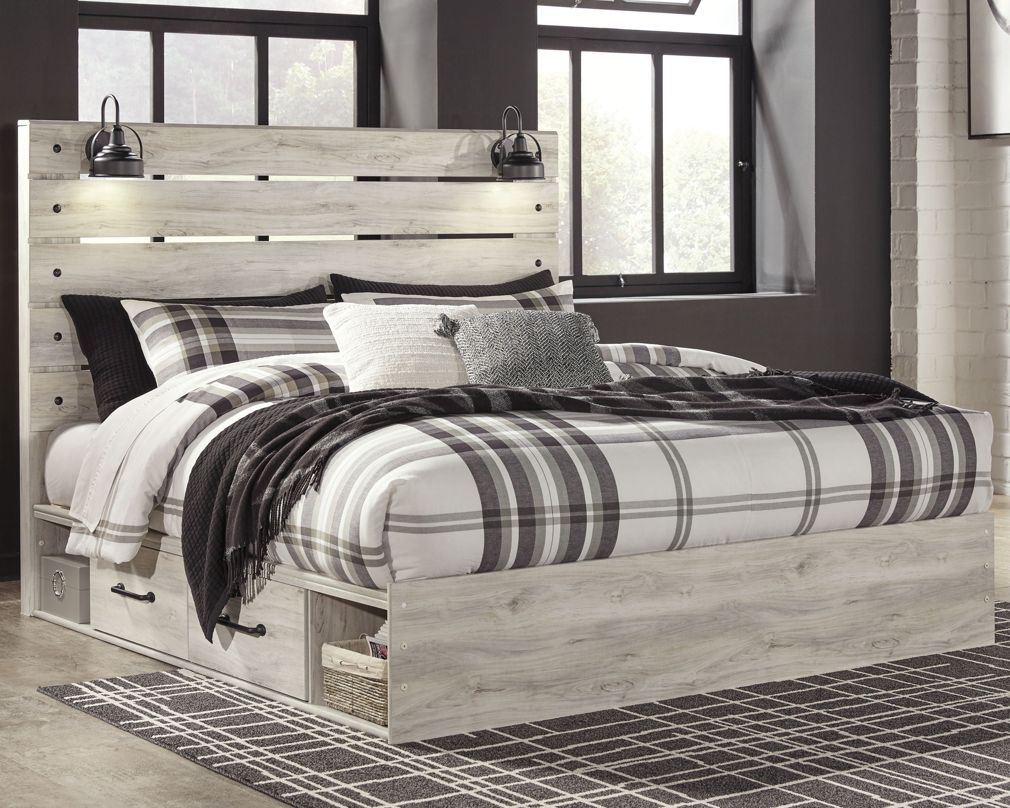 Light beige panel bed with side drawers and slatted headboard, black-and-white plaid bedding