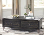 Lift-top cocktail table in dark gray wood with two drawers and a lift top panel