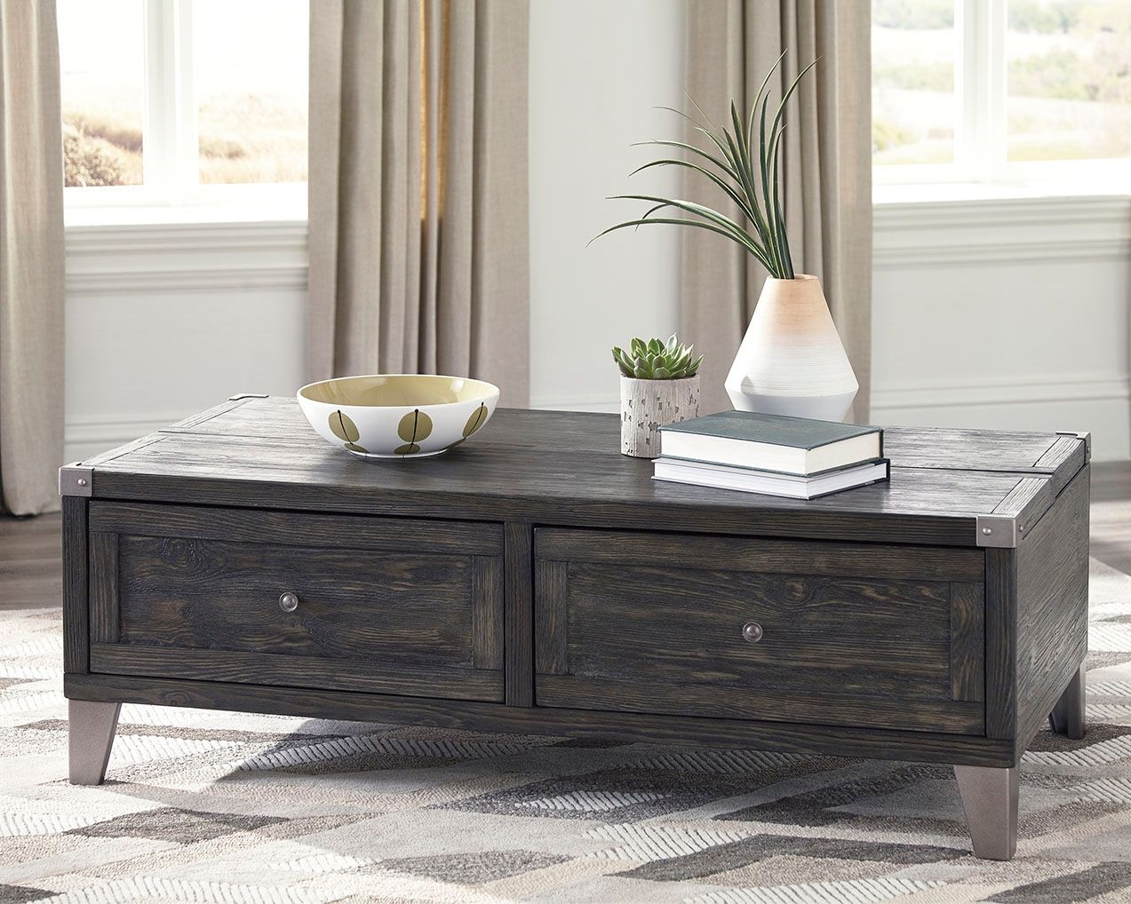 Lift-top cocktail table in dark gray wood with two drawers and a lift top panel
