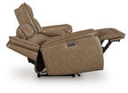 Power reclining loveseat with center console, adjustable headrest, extended footrest, brown upholstery