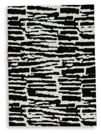 Black-and-white abstract striped area rug with dense horizontal brushstroke blocks
