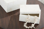 Aldenburg cream patterned box set of 2, one open showing white decorative pieces