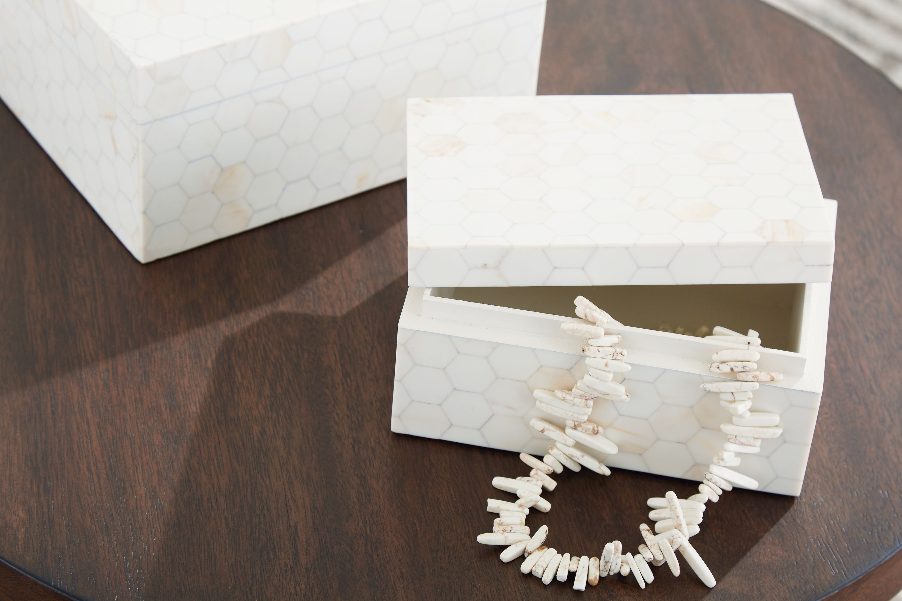 Aldenburg cream patterned box set of 2, one open showing white decorative pieces