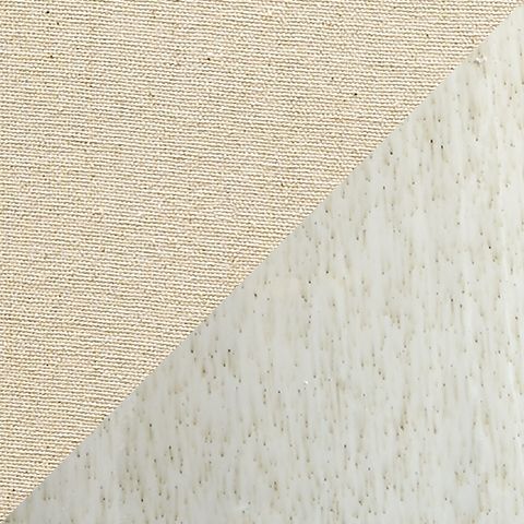 Close-up of beige speckled ceramic texture and seam on lamp shade
