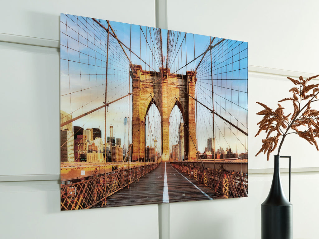 Framed wall art print of bridge walkway stretching forward between towers