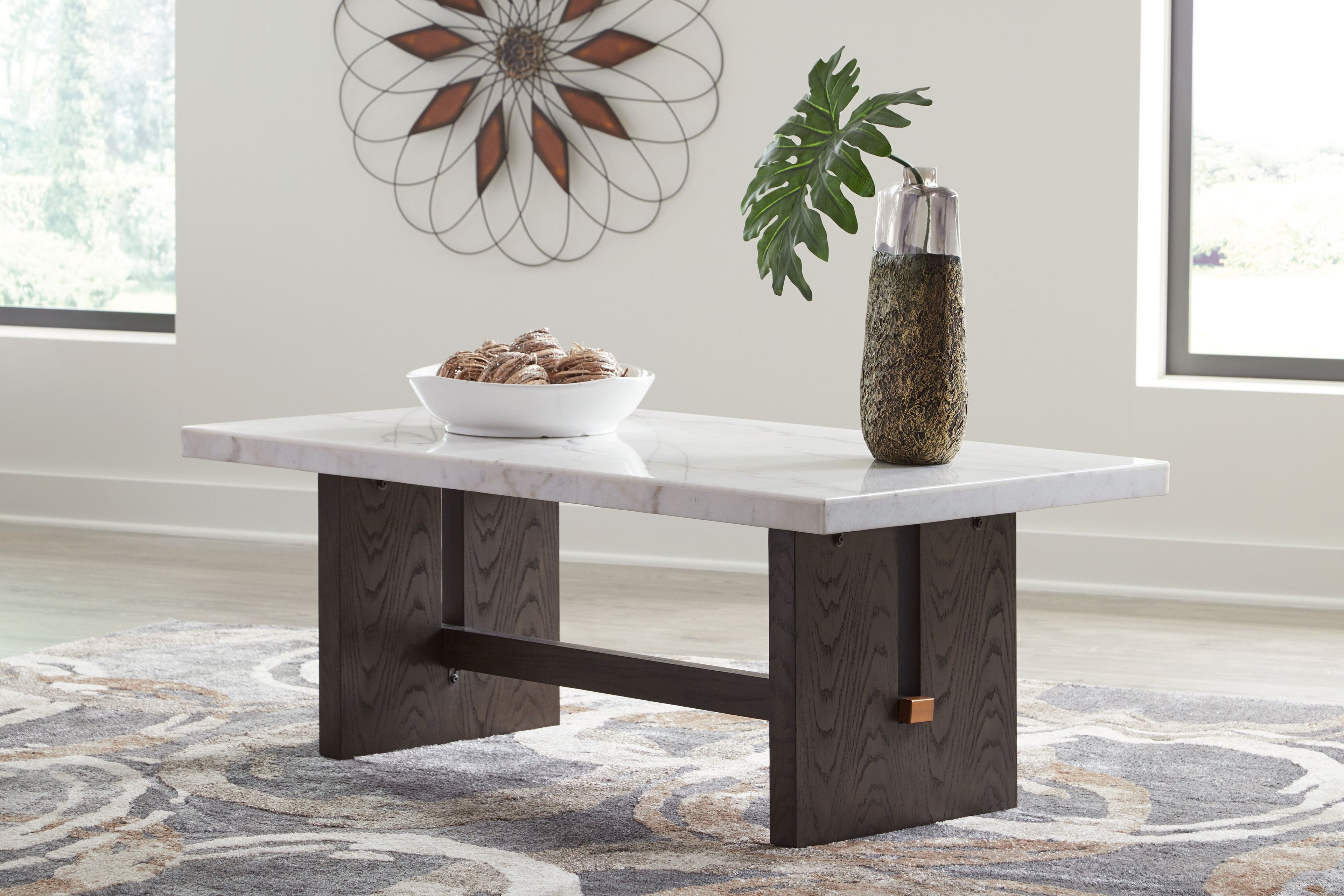 Rectangular cocktail table with white top and dark brown base frame