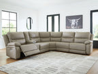 Pebble power reclining sectional sofa with corner layout and padded armrests