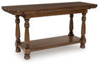 Brown flip-top sofa table with turned legs and lower shelf, hinged top