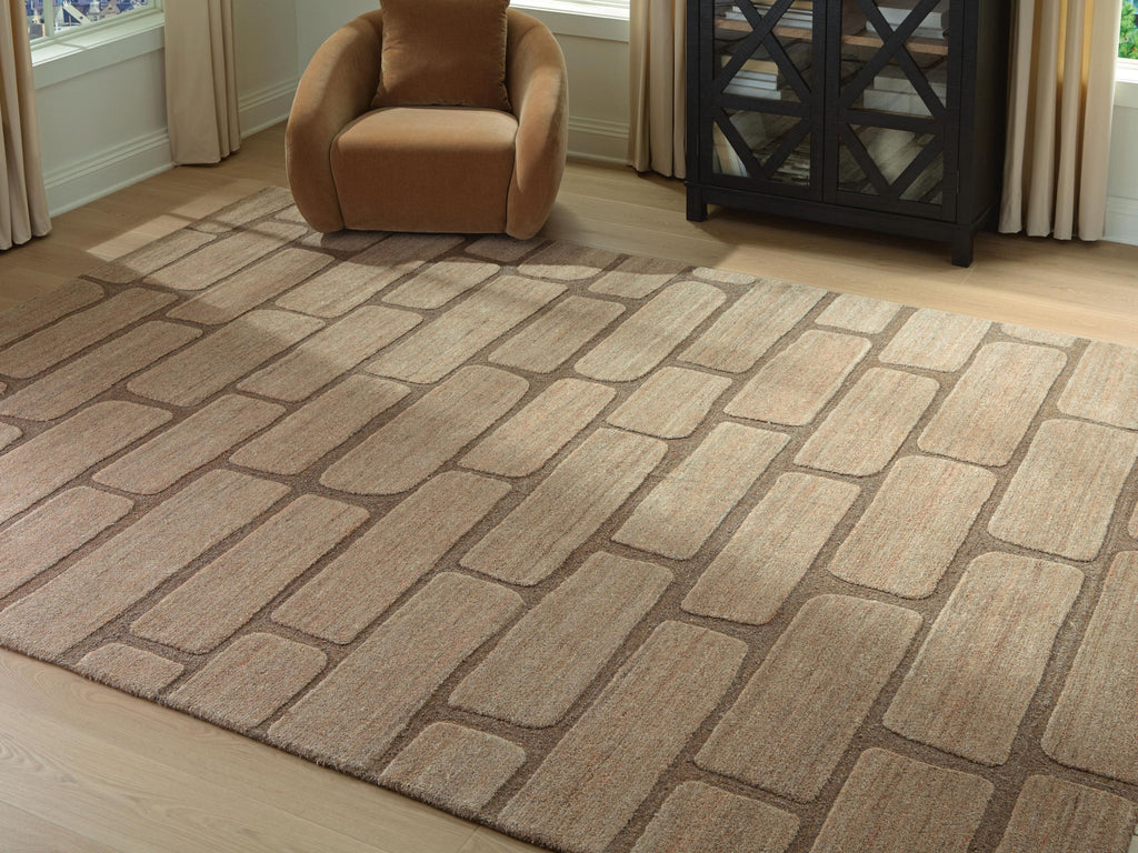 Beige and brown brick-pattern area rug with low textured pile