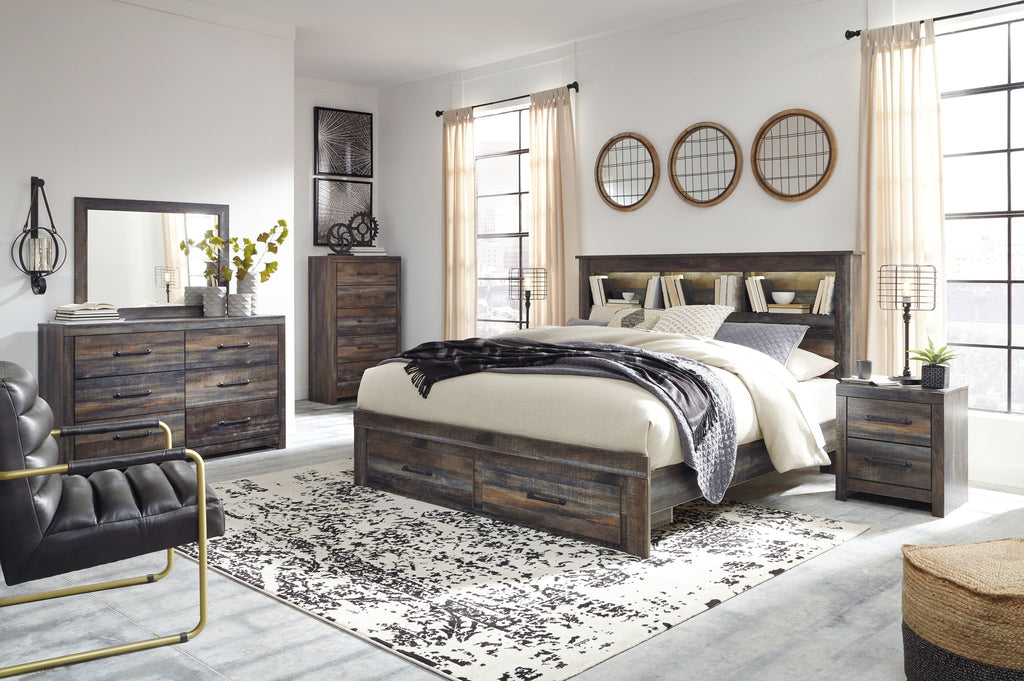 Panel bookcase bed with side storage drawers, dark wood finish, white bedding
