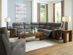 Dark gray power reclining sectional set with tufted back and padded recliner arms