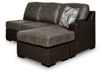 Sofa chaise with wide chaise ottoman in dark brown fabric, back cushions and throw pillow