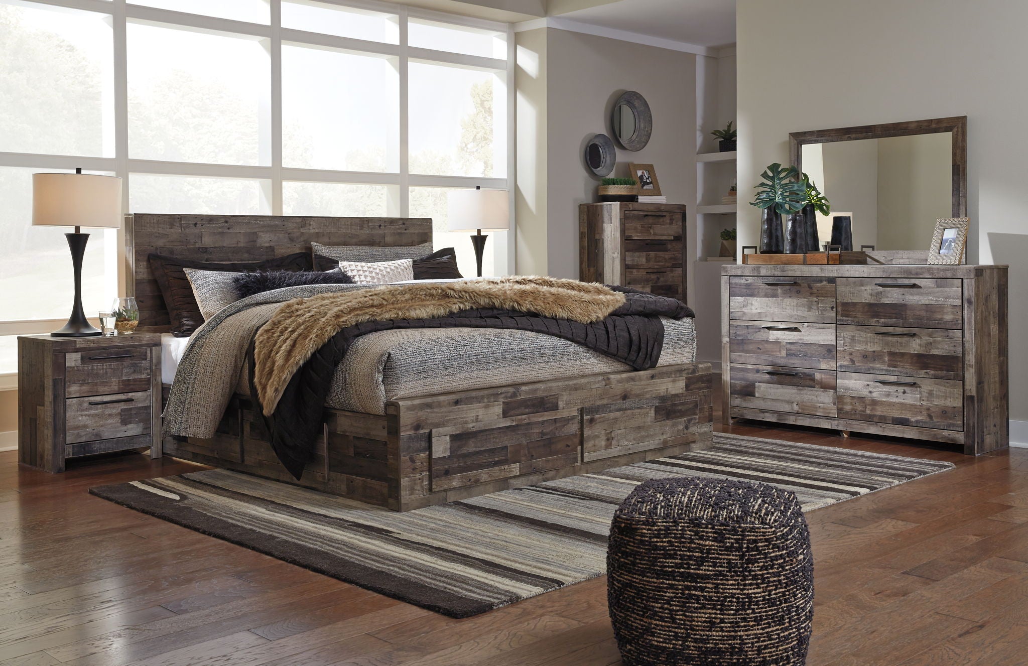 Derekson panel bedroom set with bed and matching dresser with drawer fronts in gray