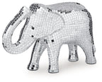 Silver mosaic elephant sculpture with trunk raised and reflective mirror tile pattern