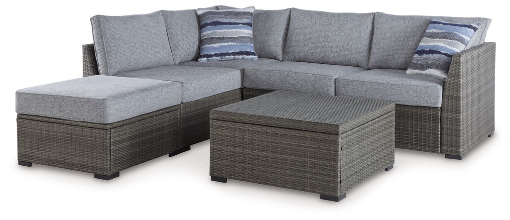Gray outdoor loveseat sectional with armrests, two ottomans, and coffee table set