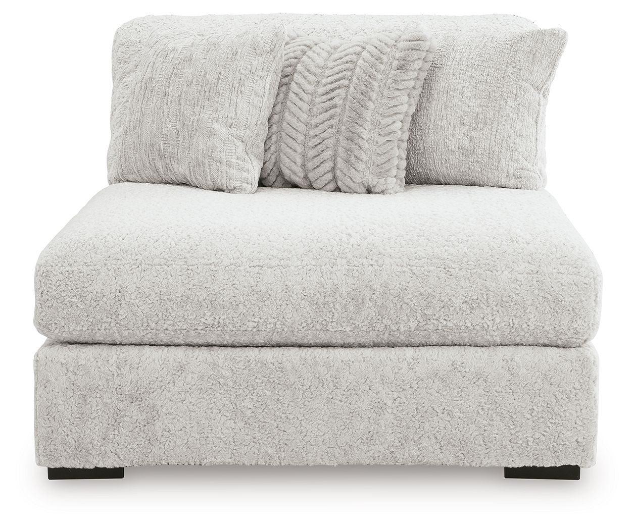 Armless chaise in light gray textured fabric with two decorative pillows and thick seat