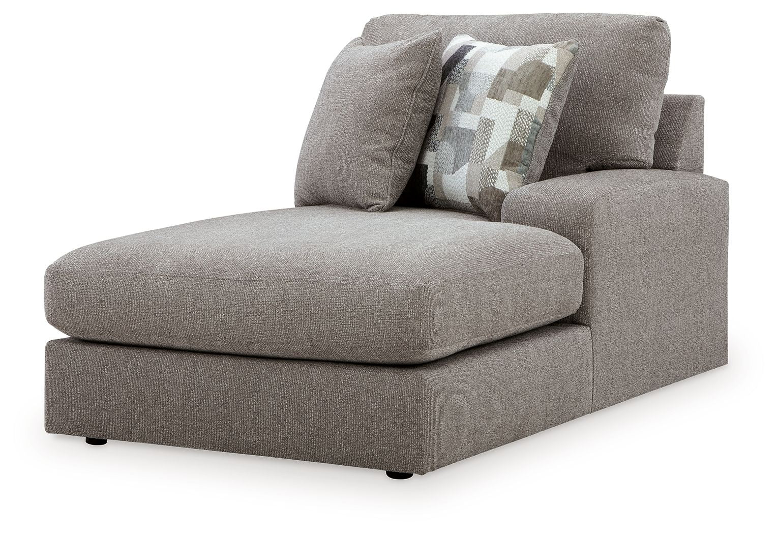 Smoke gray corner chaise with curved armrest and patterned throw pillow