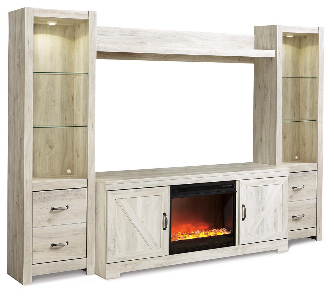 Beige wood entertainment center with open shelves and glass-front electric fireplace insert