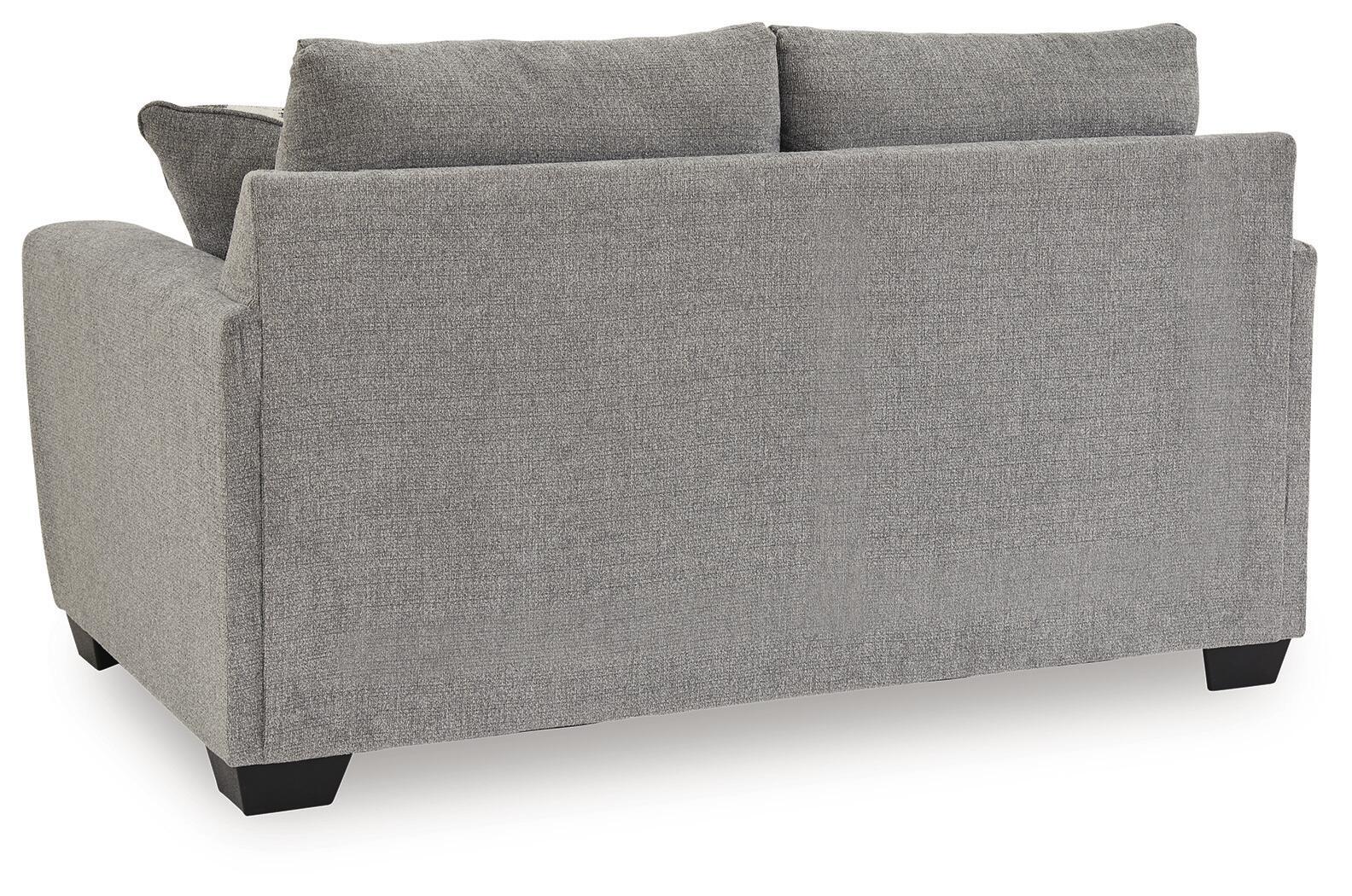 Gray upholstered Loreo loveseat with boxy arms and black legs