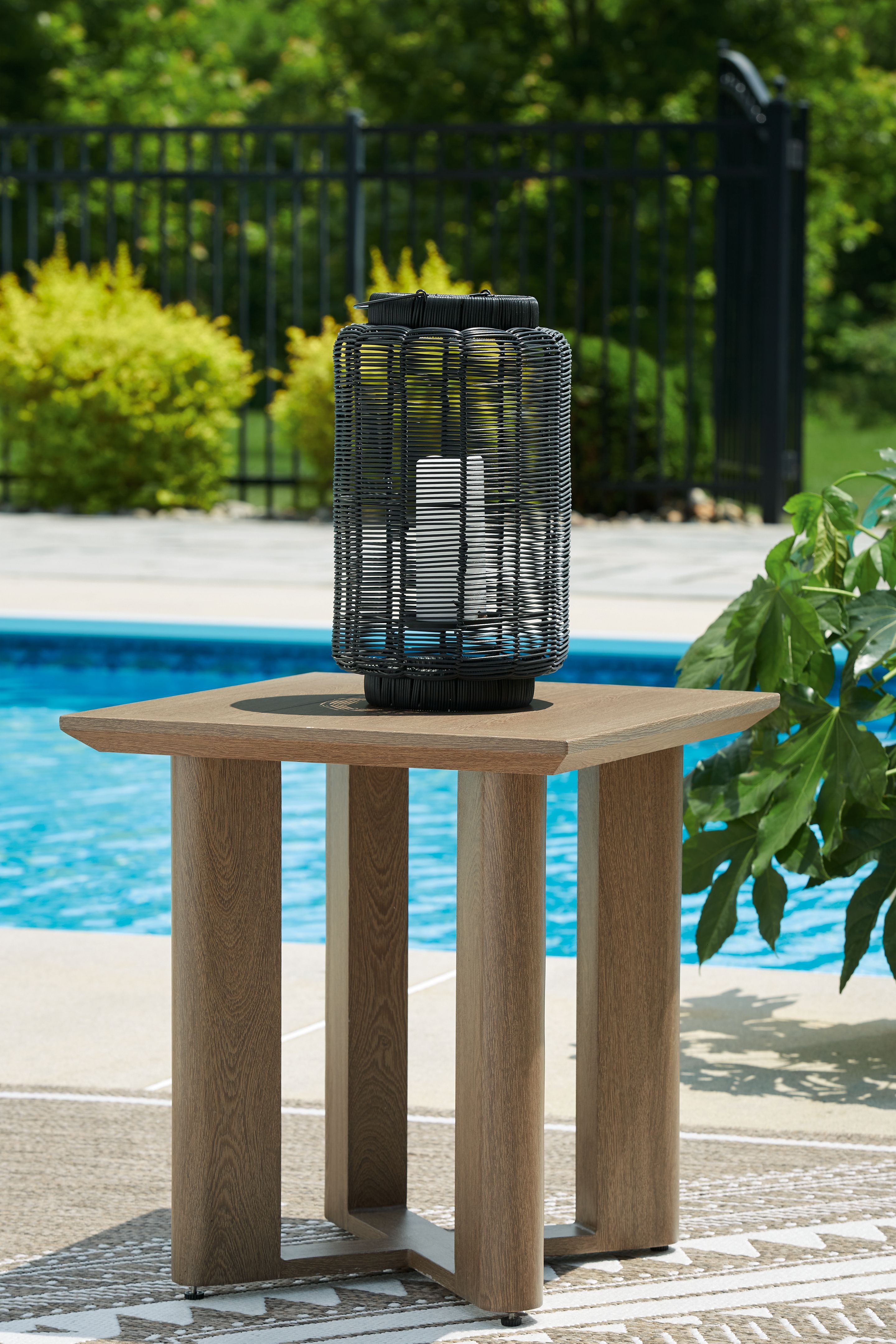 Square end table in dark brown wood with square top and angled legs