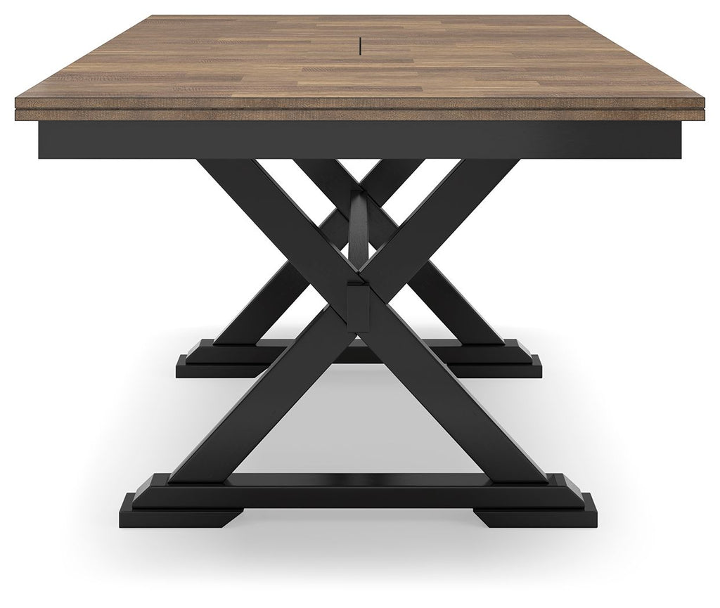 Dark brown dining table with extension seams and black X-shaped base legs