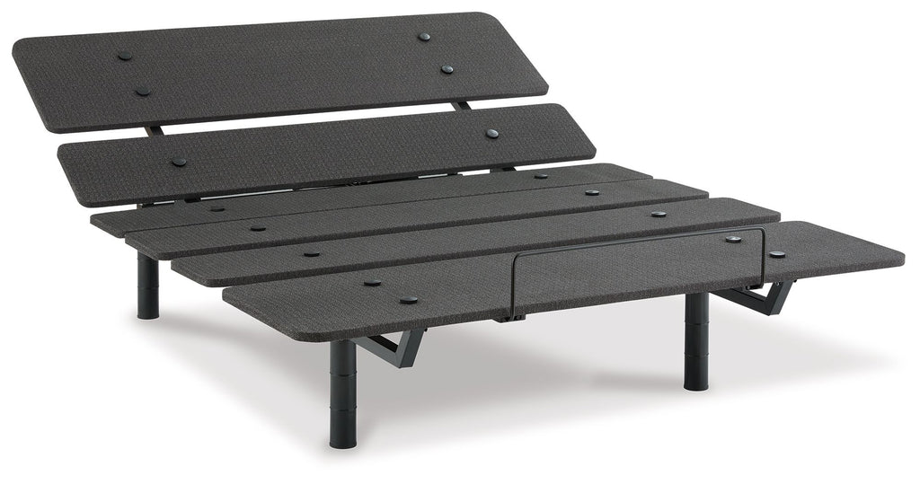 Adjustable bed base in black with layered slats, side lever, and four legs
