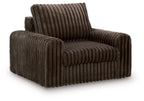 Chocolate corduroy power gliding chaise with wide arms and tall backrest.
