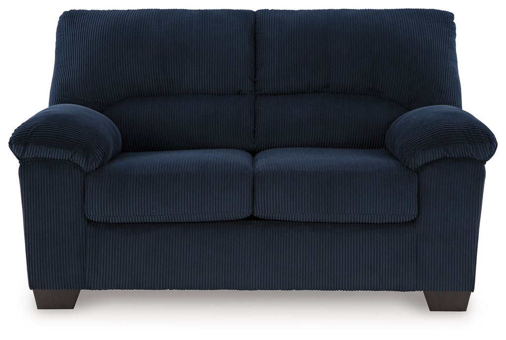 Upholstered loveseat, dark blue striped fabric, tufted back and padded arms