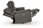 Gray power reclining sofa showing extended footrest and adjustable headrest