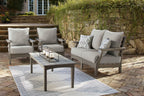 Gray outdoor lounge set with two chairs, sofa seat, and matching coffee table