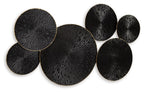 Black and gold circular wall decor with six fan-radial metal discs in curved row