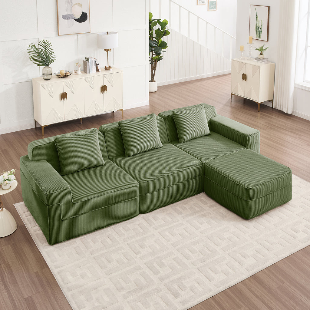 Green corduroy modular sectional sofa with chaise and throw pillows