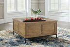 Brown lift-top cocktail table with open top and paneled cabinet fronts