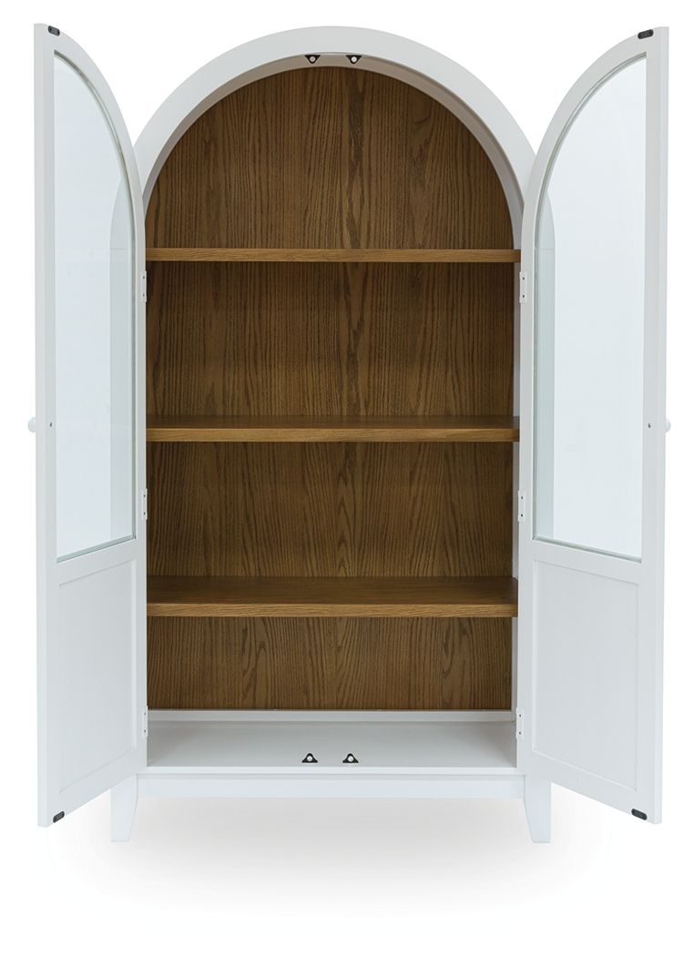 White accent cabinet with arched interior shelves and double doors open