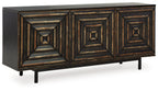 Distressed black accent cabinet with three door panels, geometric fronts, and tapered legs.