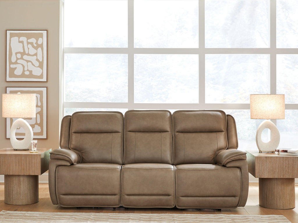 Power reclining sofa with adjustable headrests in taupe leather-look upholstery, wide arms