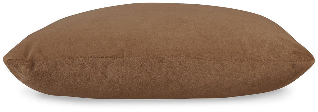 Light brown oval accent pillow with textured surface