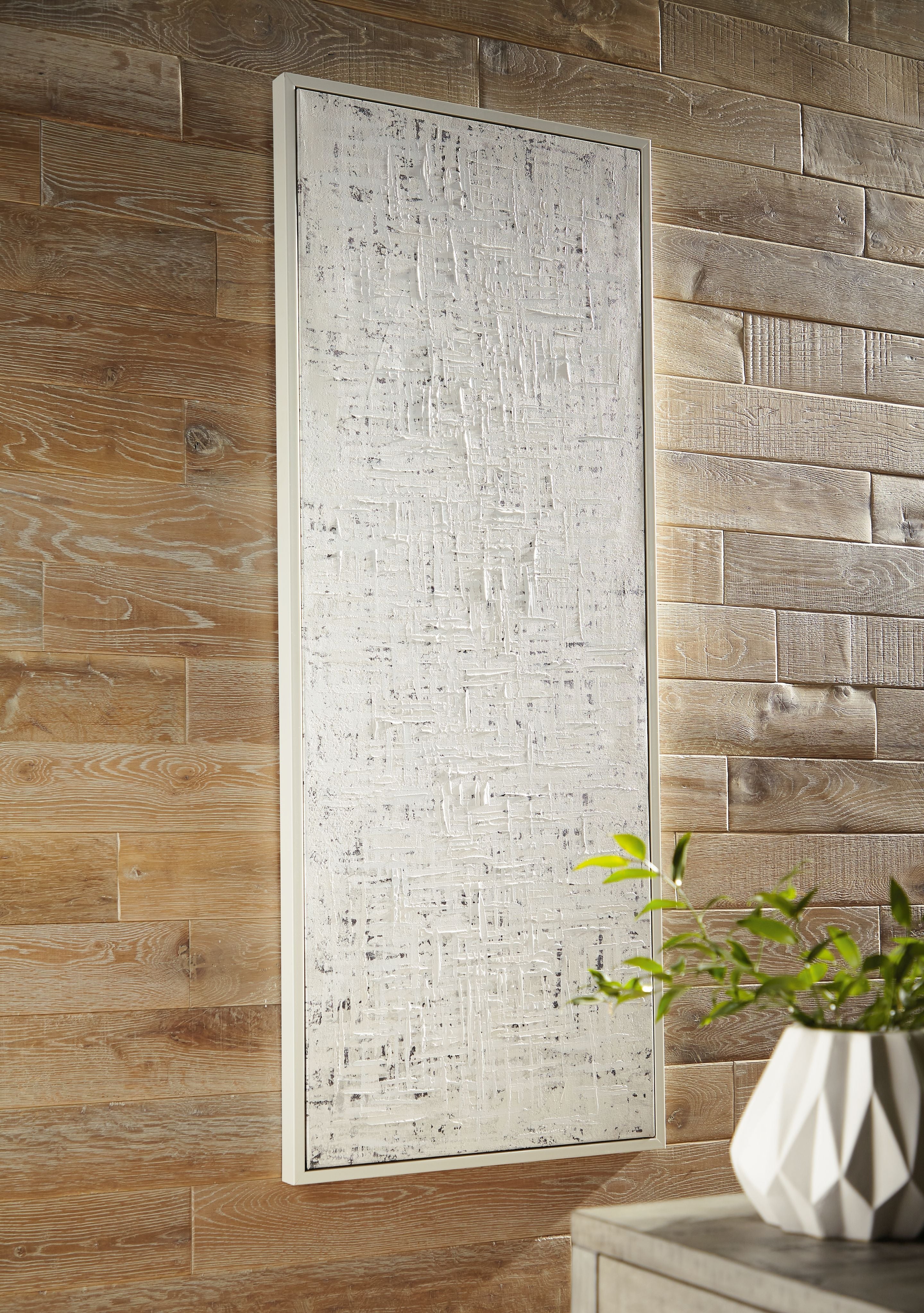 Daxonport wall art with muted light gray abstract texture, framed in white