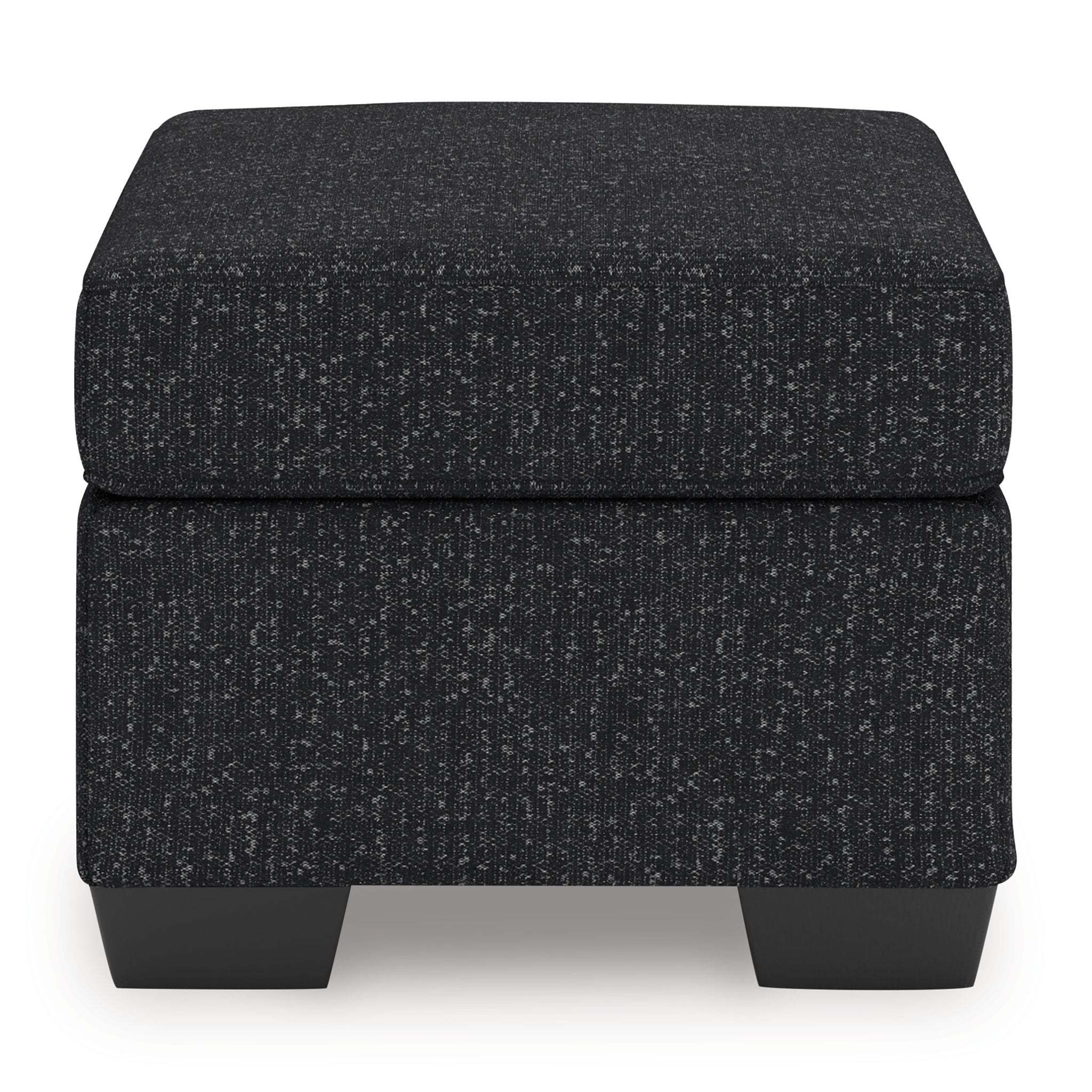 Upholstered ottoman with dark textured fabric, padded top, and short legs