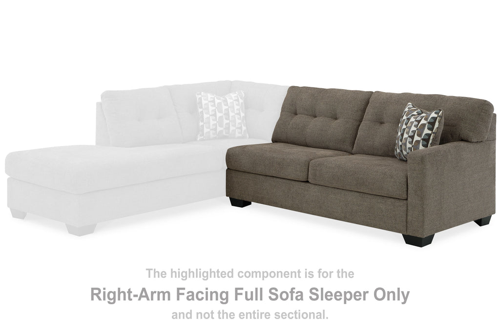 Right-arm facing sofa sleeper section with dark gray upholstery and patterned accent pillow