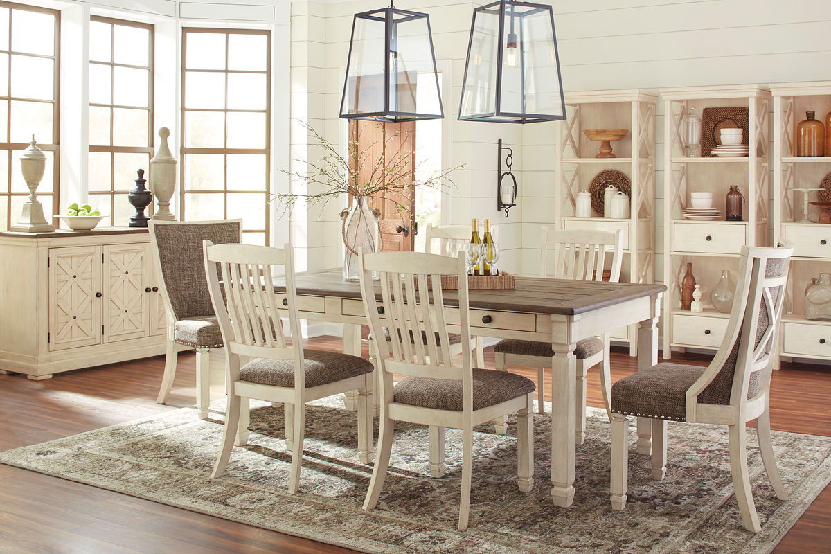 Rectangular dining table set with dark tabletop, beige chairs, and upholstered bench