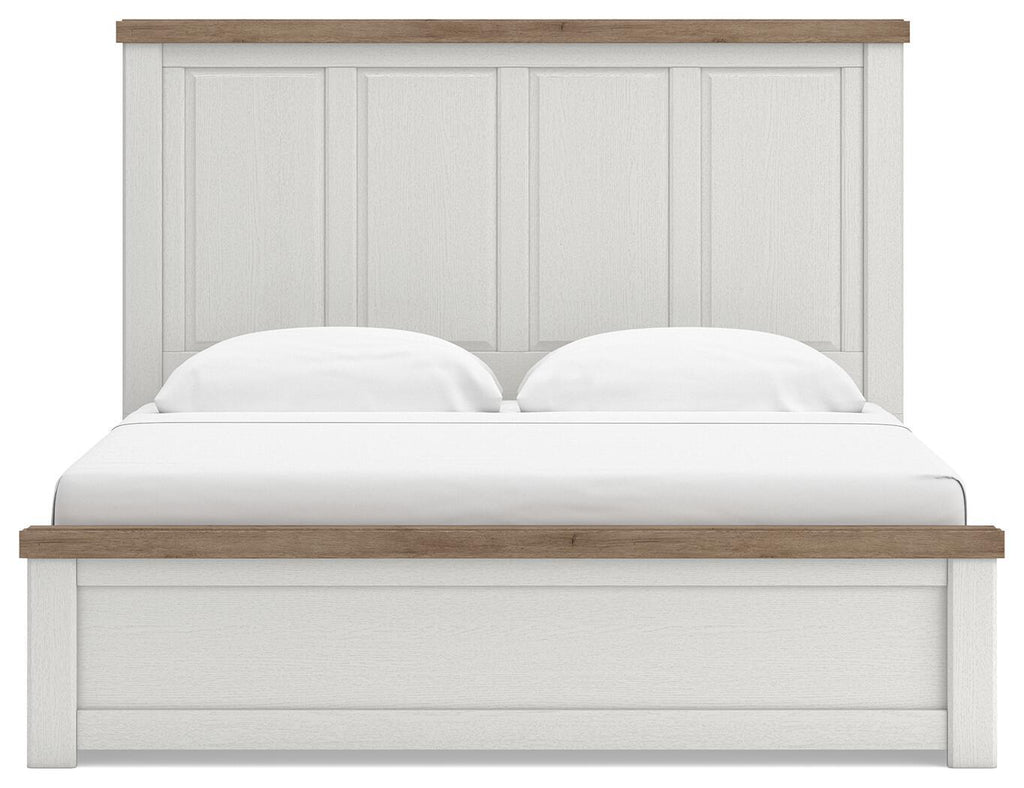 White panel bed with paneled headboard, light wood top rail, cushioned mattress