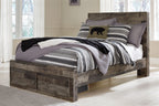 Panel bed with storage drawers, dark gray wood-look finish, side view with layered bedding