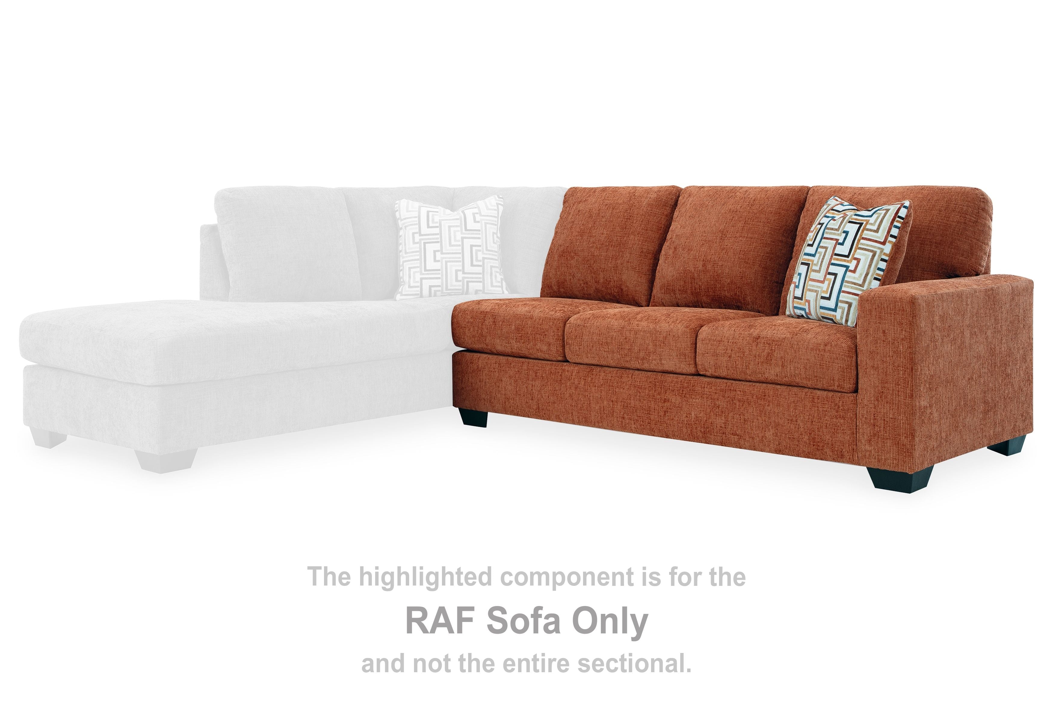Rust orange RAF sofa only beside white sectional, with patterned throw pillow