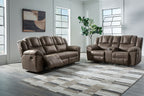 Dark brown reclining loveseat and sofa set with tufted back cushions and rounded armrests