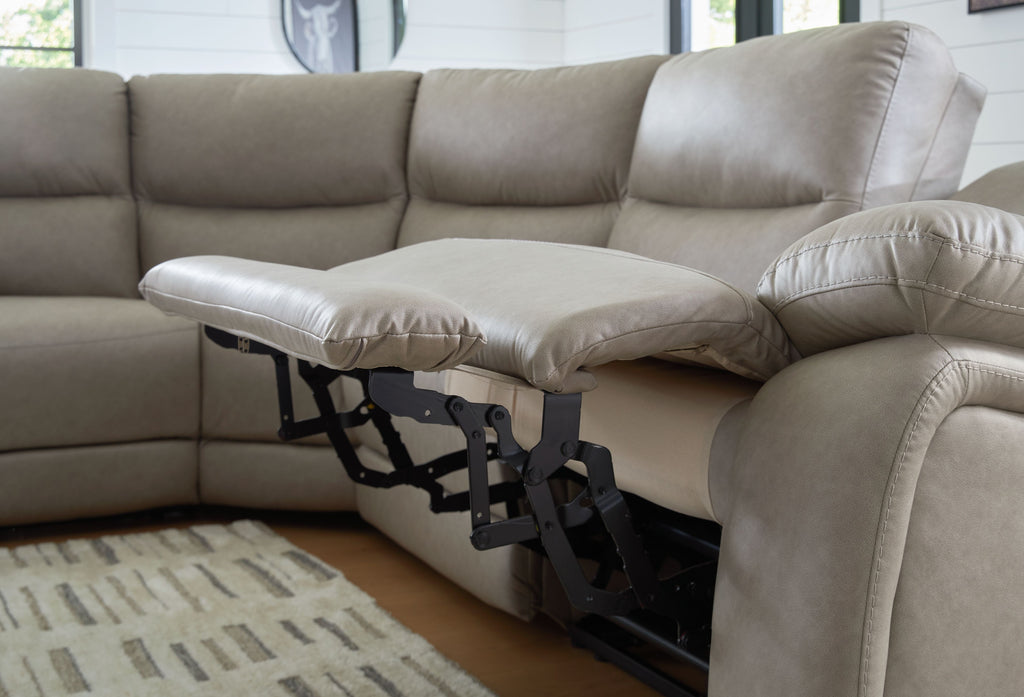 Pebble power recliner showing footrest mechanism under side seat