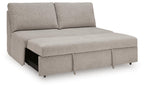 Flint gray pop-up sleeper sofa with open base revealing a dark storage compartment